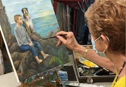 Adult student painting a dog portrait in Tarzana studio